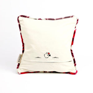 Rückseite eines lila Fluffikon Samtkissen mit Blumenmuster.