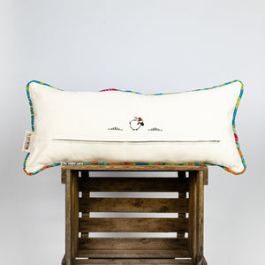 Blue decorative lumbar pillow made from shiny brocade with colourful flowers embroidery. Back of the pillow made from white cotton.