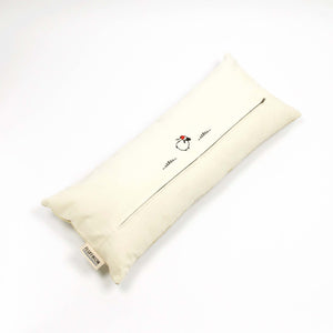 Fluffikon silk lumbar pillow made from golden moroccan fabric. The throw pillow is shown from the back.