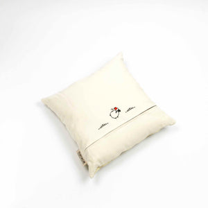 Fluffikon silk square pillow made from golden moroccan fabric. The throw pillow is shown from the back.