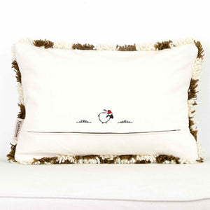 back view on a brown checkered Fluffikon throw pillow.