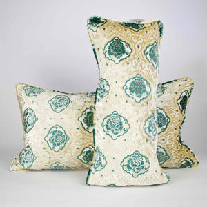 Oversize Fluffikon throw pillows in front of white background. One pillow is standing in front of the other.