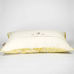 Fluffikon oversized couch pillow made from gold velvet fabric. It has an traditional moroccan / oriental look. The pillow is shown from the back