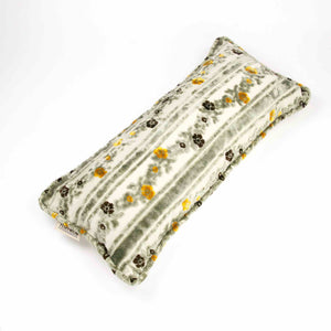 Grey oversized sofa pillow made from velvet fabrics.