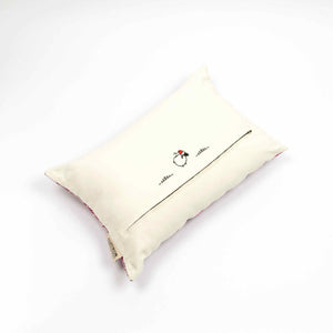 Fluffikon rectangular decorative pillow. The throw pillow is made from pink-white moroccan silk fabric. The pillow is shown from the back. Size 40x60 cm.