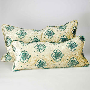 Oversize Fluffikon throw pillows in front of white background. Two pillows are standing in front of each other.