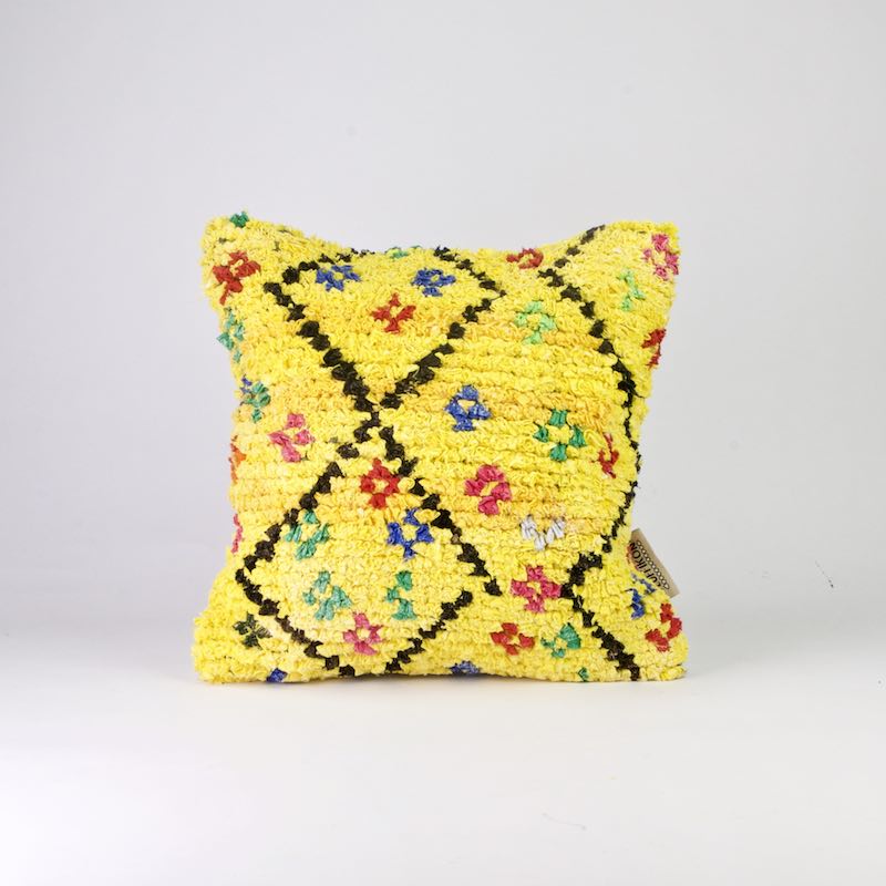 Yellow Berber cushion cover Boucherouite. The pillow is square and is quite colorful.