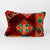 Rectangular Berber pillow made from a red Moroccan rug.