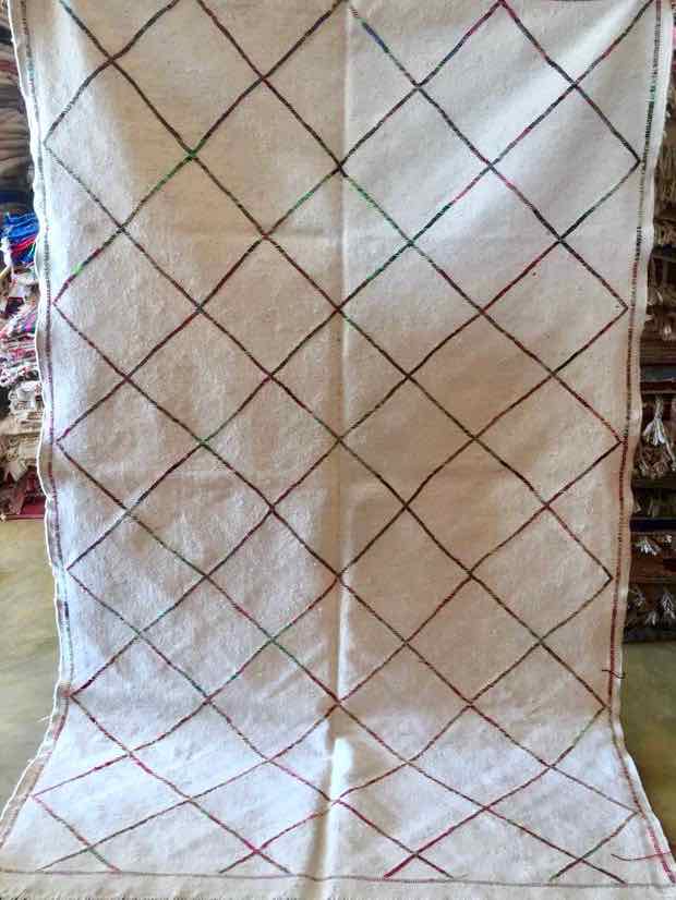 White Kilim Rug that used for our customized Fluffikon wool dog beds / cats beds.