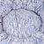 Zoom auf Kelim Hundebett aus blau weissem marokkanischen Wollteppich.