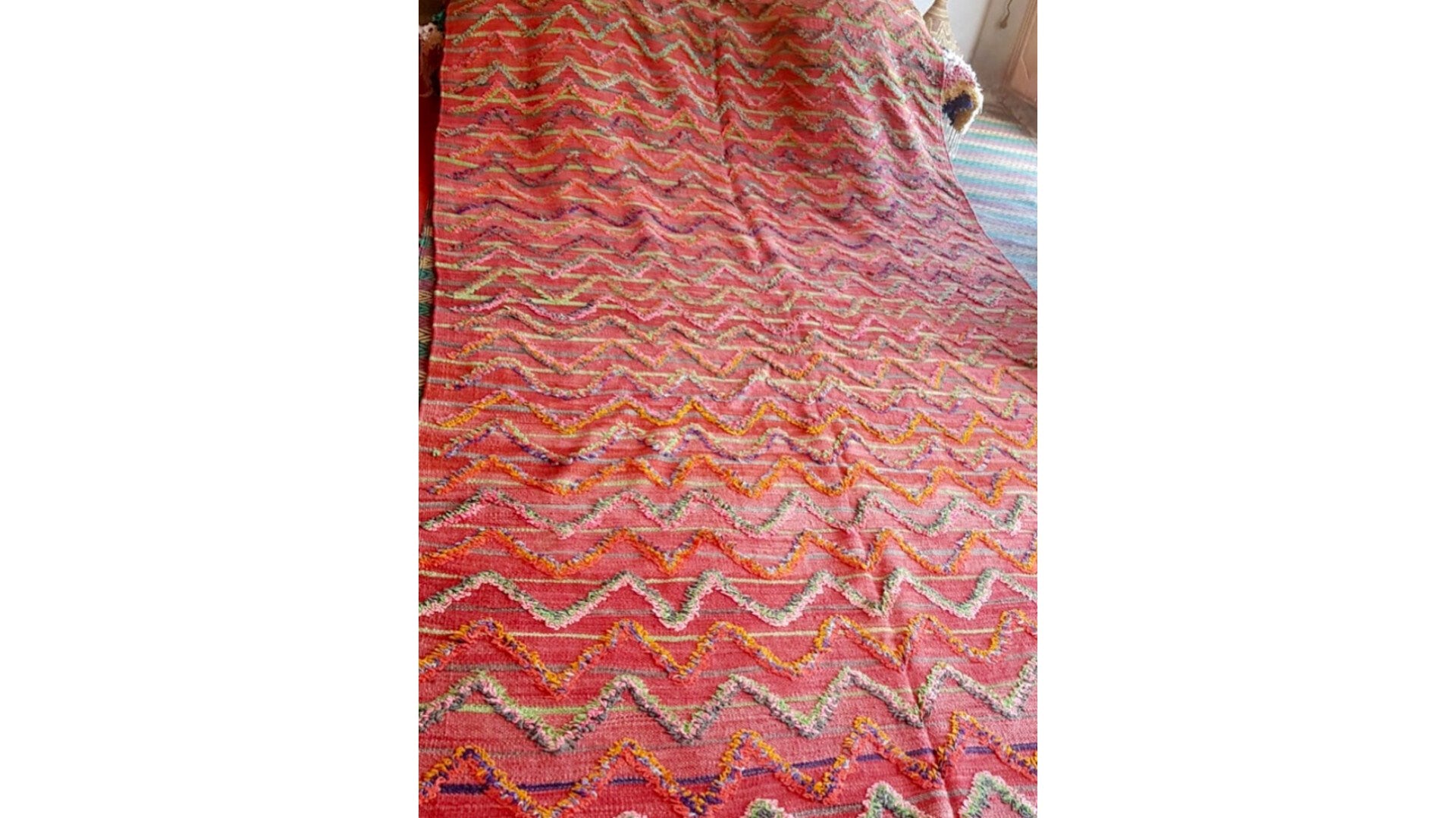 Red vintage Kilim rug that used for our customized Fluffikon wool dog beds / cats beds.