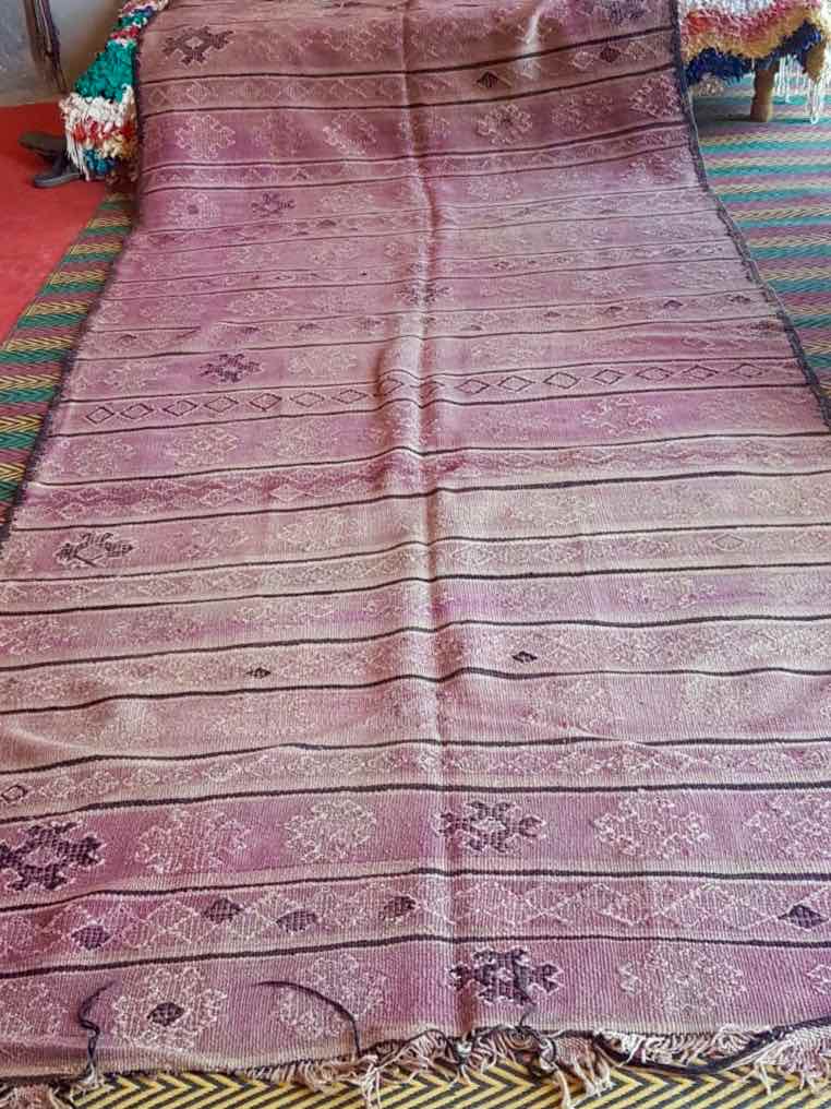 Purple vintage Kilim rug that used for our customized Fluffikon wool dog beds / cats beds.