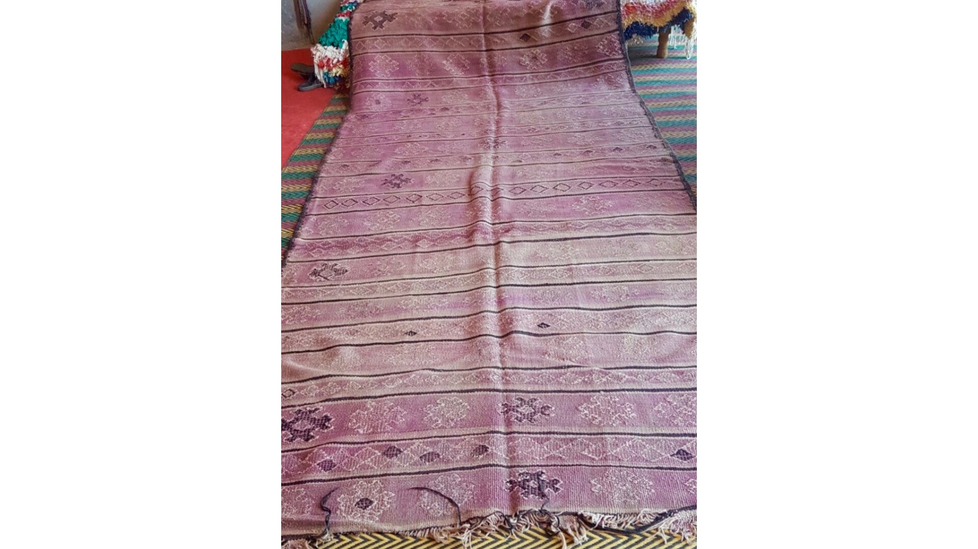 Purple vintage Kilim rug that used for our customized Fluffikon wool dog beds / cats beds.