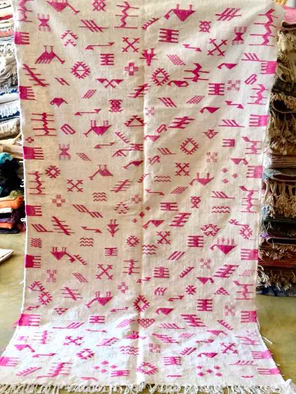 White Pink Kilim Rug that used for our customized Fluffikon wool dog beds / cats beds.