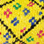 Zoom auf gelbes Boucherouite Berber Kissen mit buntem Muster. Es ist ideal als Dekokissen für Kinderzimmer geeignet.