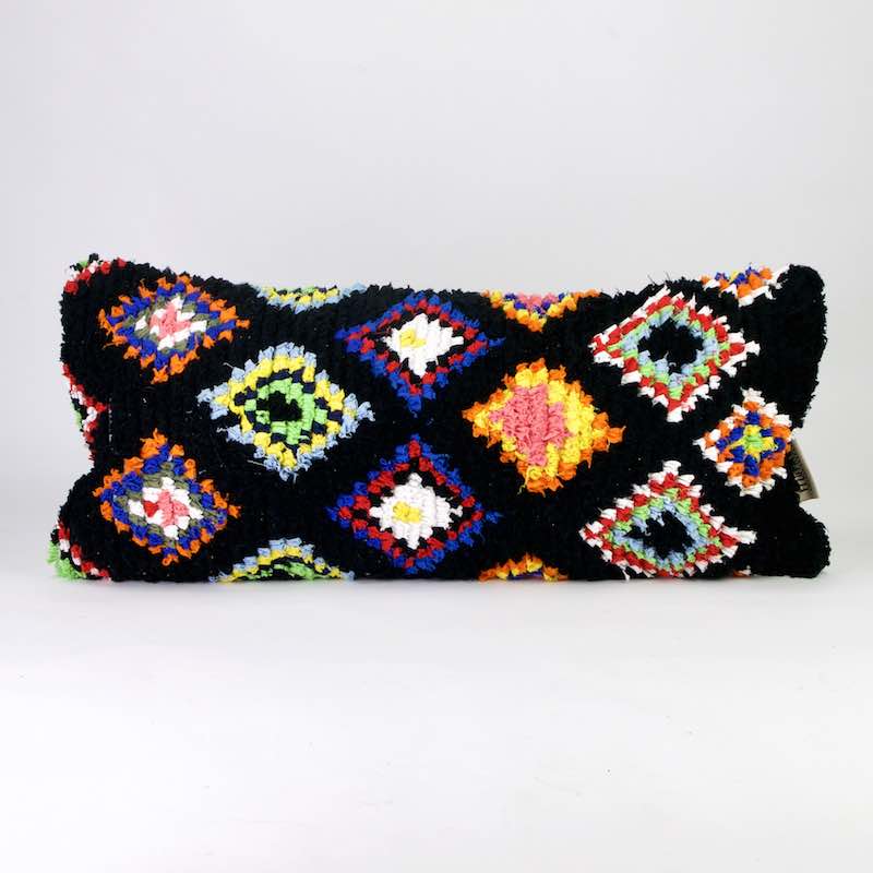 Black Boucherouite Fluffikon lumbar pillow. The pillow size is 35x70 cm.