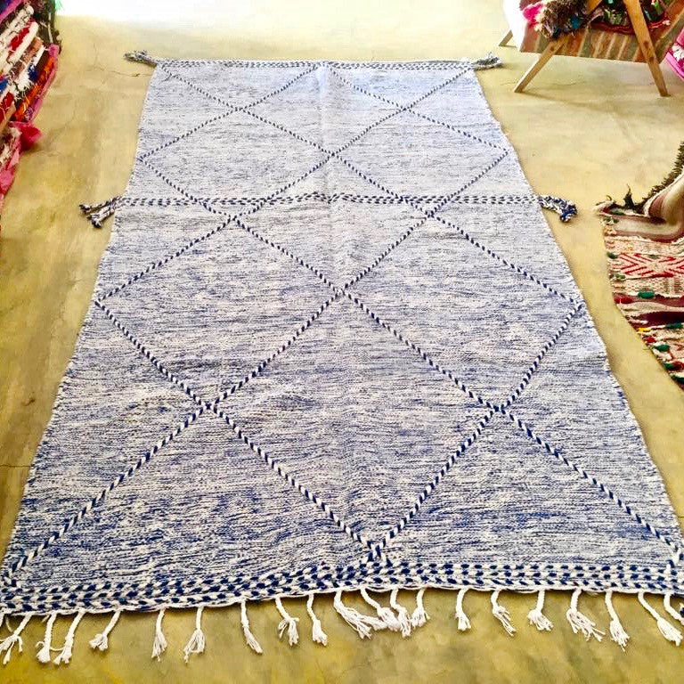 Blue and white Moroccan Kilim rug.