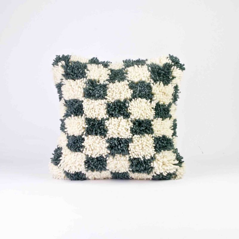 Checkered Moroccan pillow. The pillow has a blue-grey white checkered pattern. The size is 45x45 cm.
