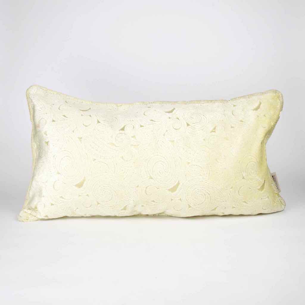 Oversized beige Fluffikon XXL cushion standing in front of white background.