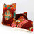 Three Berber pillows made from a red Moroccan rug.