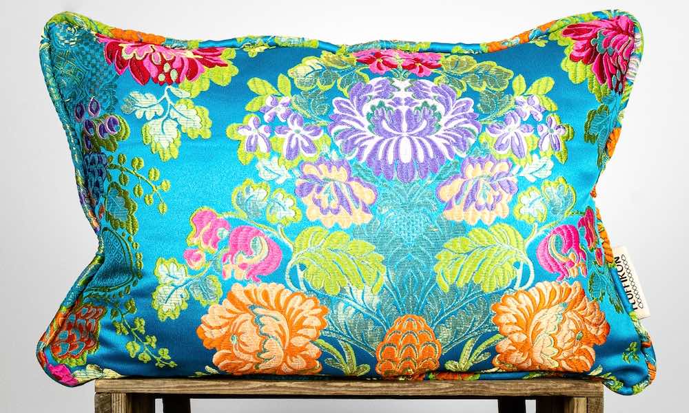 Turquoise blue Fluffikon brocade pillow. 