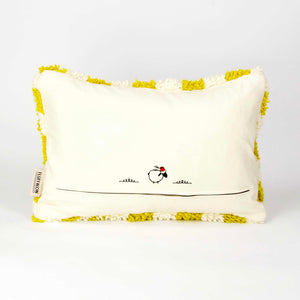 Back view on a Beni Ourain Fluffikon pillow with yellow white checkered pattern. The pillow is made from wool. It stands in front of a white background.
