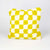 Beni Ourain Fluffikon pillow with yellow white checkered pattern. The pillow is made from wool. It stands in front of a white background.