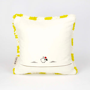 The back view on a Beni Ourain Fluffikon pillow with yellow white checkered pattern. The pillow is made from wool. It stands in front of a white background.