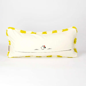 View on the back of a Beni Ourain Fluffikon lumbar pillow with yellow white checkered pattern made from a  wool carpet.