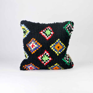 Black Boucherouite Berber Cushion cover with colorful spots.