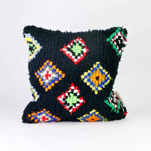 Black Fluffikon Boucherouite Berber Cushion cover with colorful spots.