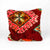 Standing red Berber pillow made from a vintage wool rug.