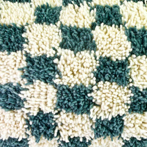 Zoom on checkered Moroccan Throw Pillow wool.