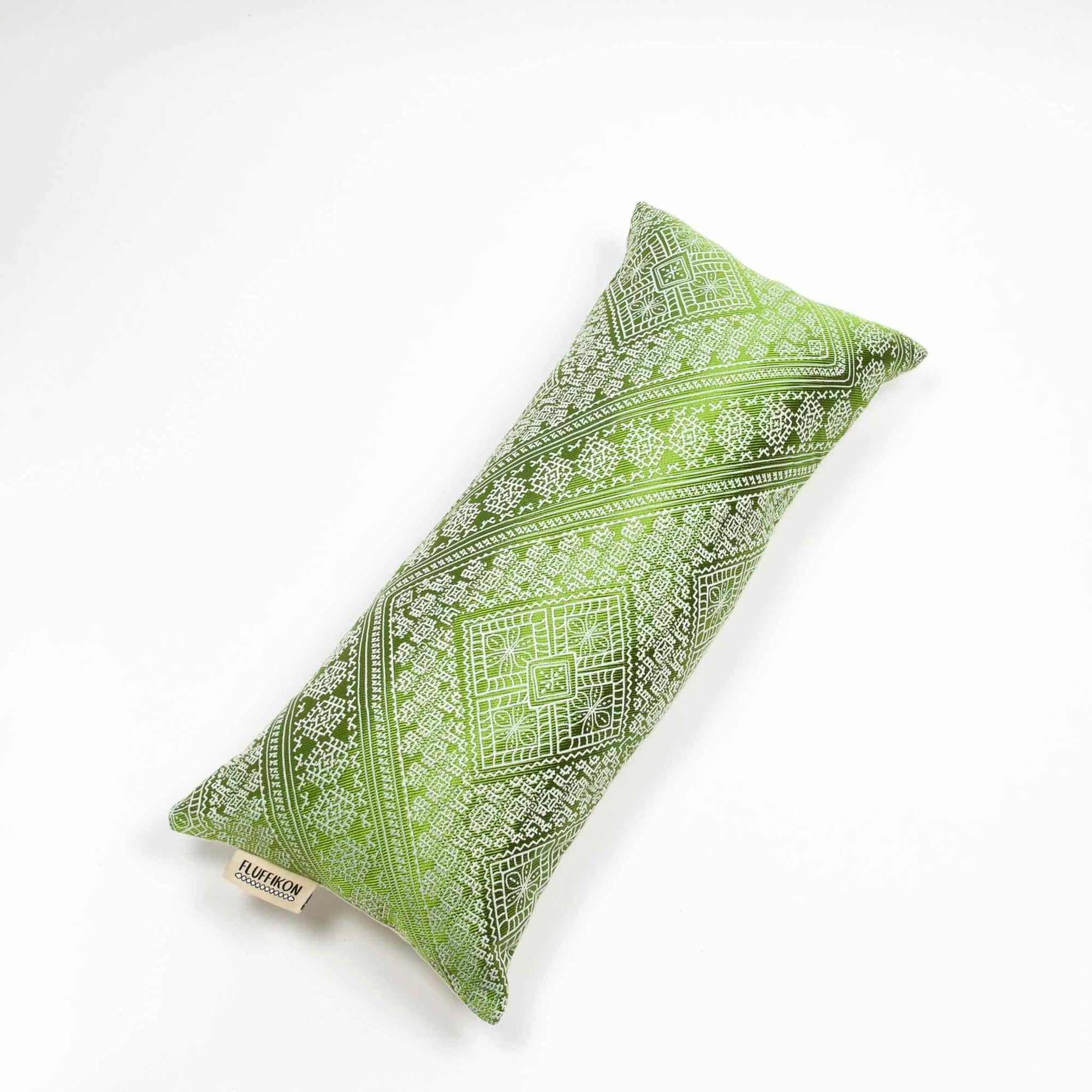 Fluffikon silk lumbar pillow made from green moroccan fabric. The throw pillow is shown from the back. Size: 35x70 cm