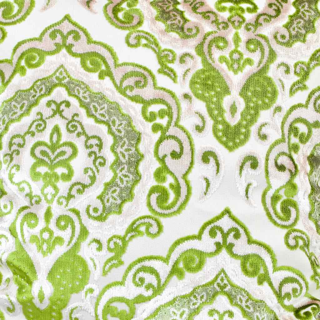 Zoom on Green Beige Sofa Pillow on a wooden box.