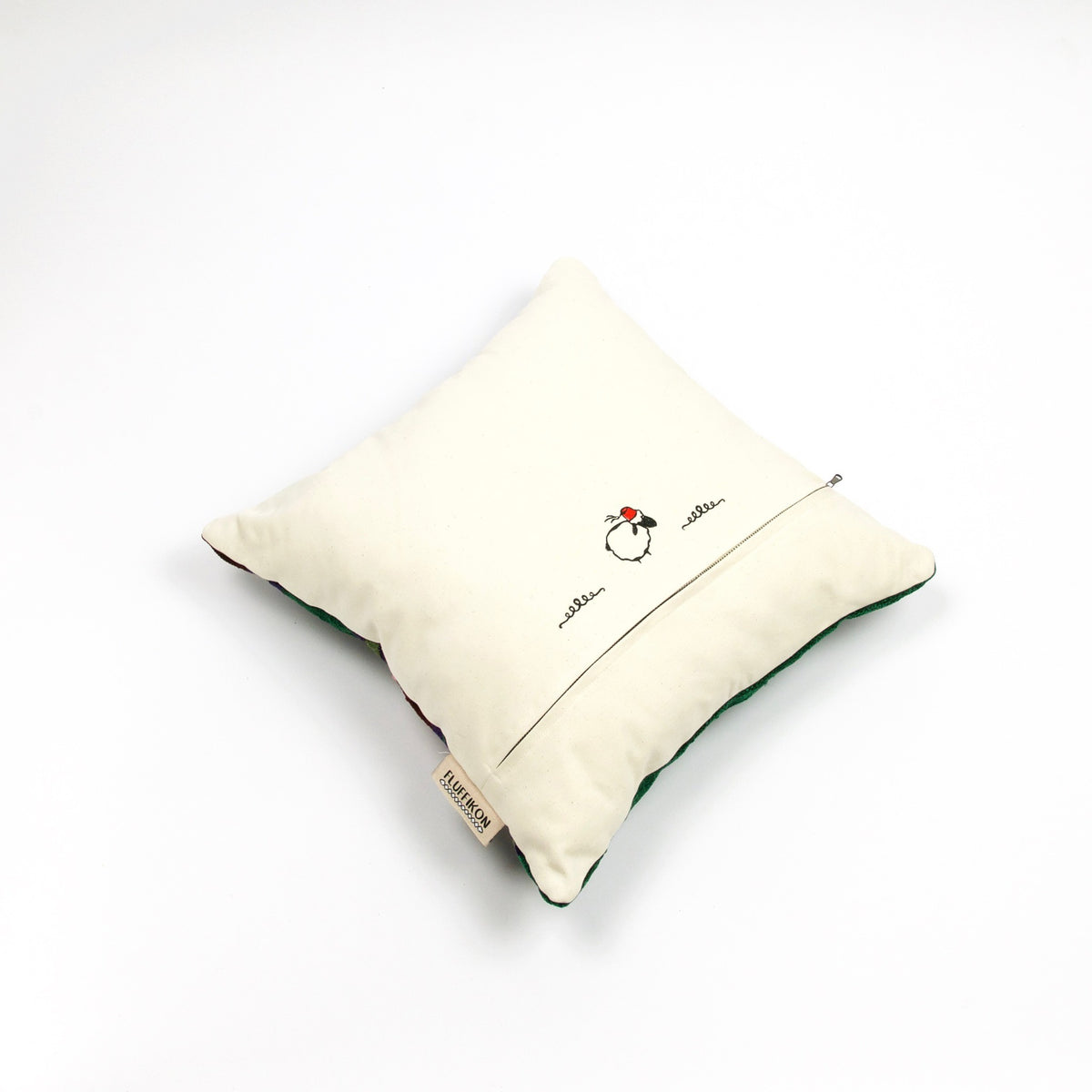 Fluffikon brown green decorative pillow with colourful berber symbols. It is made from a unique handmade thread rug.