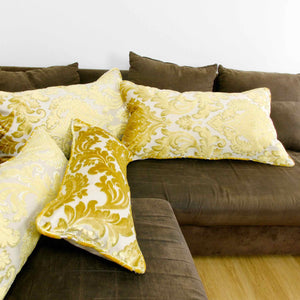 Four Fluffikon oversized couch pillows made from gold velvet fabric. The XXL throw pillows  traditional moroccan / oriental look. 
