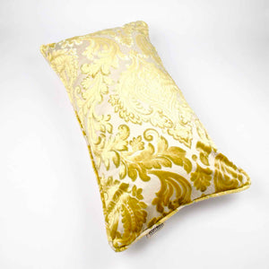 Fluffikon oversized couch pillow made from gold velvet fabric.