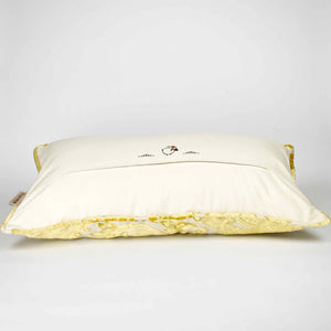 Fluffikon oversized couch pillow made from gold velvet fabric. It has an traditional moroccan / oriental look.  The pillow is shown from the back
