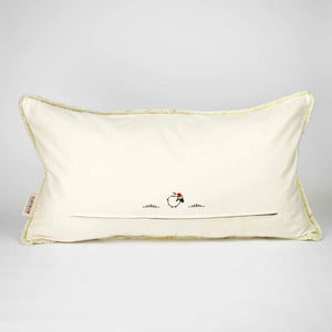 Fluffikon oversized lumbar pillow made from beige velvet with golden threads. The pillow is shown from the back.