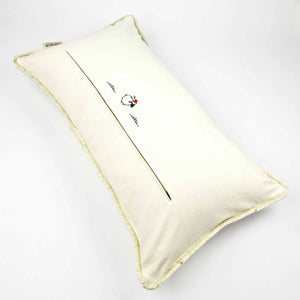 Fluffikon oversized lumbar pillow made from beige velvet with golden threads. The view is on the pillow back.