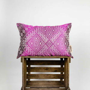 Fluffikon rectangular decorative pillow. The throw pillow is made from pink-white moroccan silk fabric.