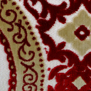 Zoom on traditional moroccan red-yellow velvet.