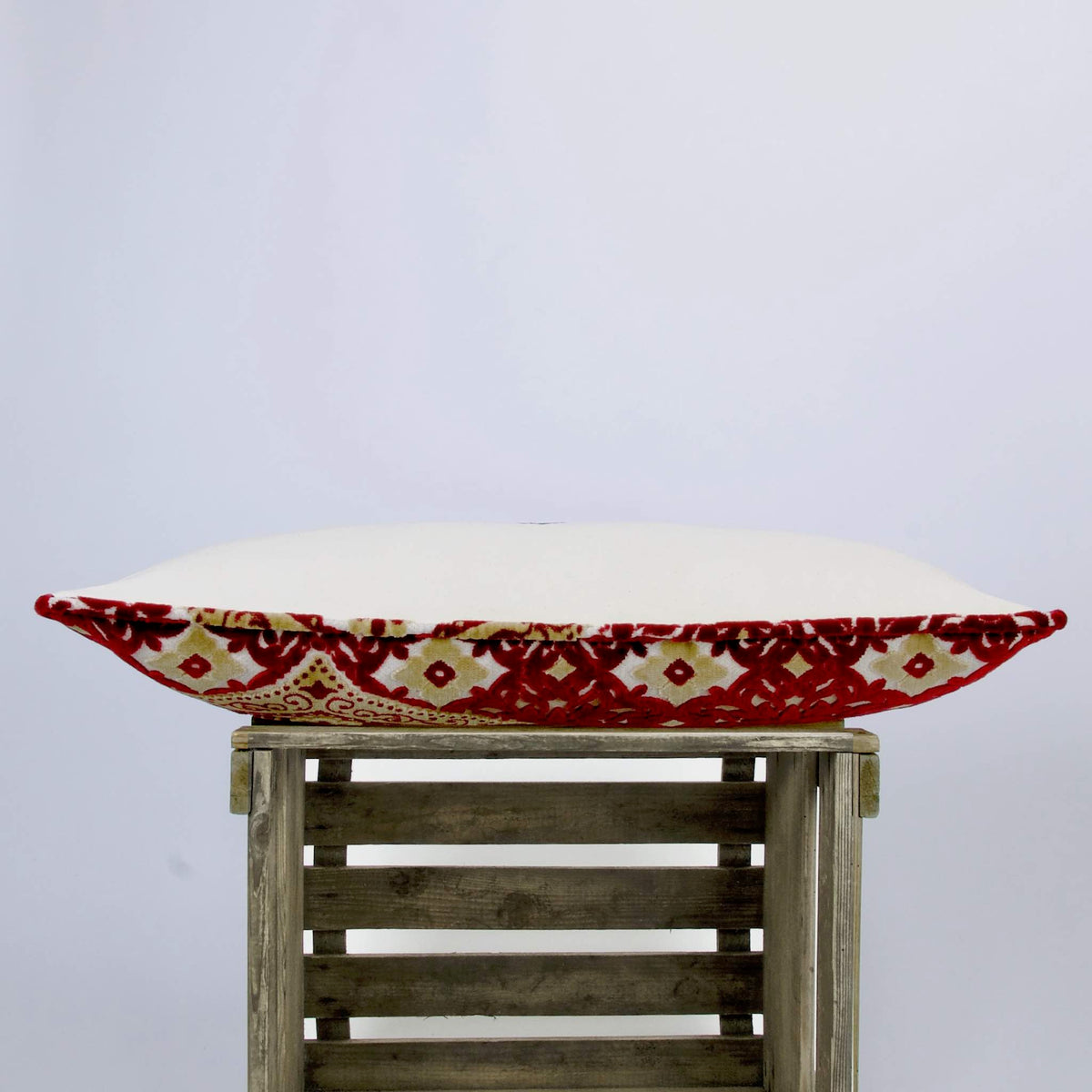 Side view on moroccan lumbar pillow with traditional pattern.