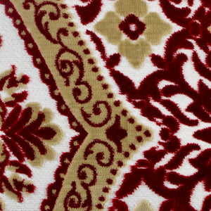 Detailed zoom on velvet fabric of a Moroccan couch cushion.