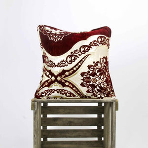 Red white royal velvet pillow in a wooden box. The pillow is made from beautiful burgundy velvet and has a moroccan look.