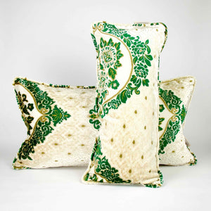 Two large pillows with oriental look. The pillows have a traditional green moroccan pattern on a beige canvas background. 