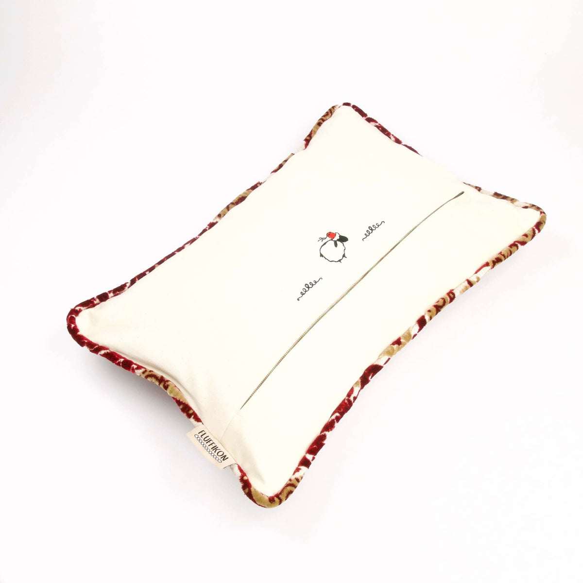 The back of a velvet cushion with traditional moroccan piped edges.