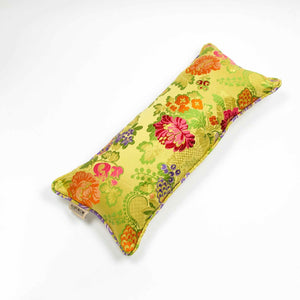 Top of yellow lumbar Brocade pillow with flowers embroidery