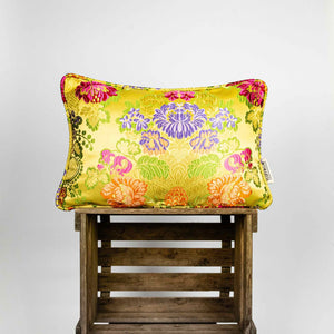 Yellow Brocade pillow on wooden box. Size 40x60 cm.